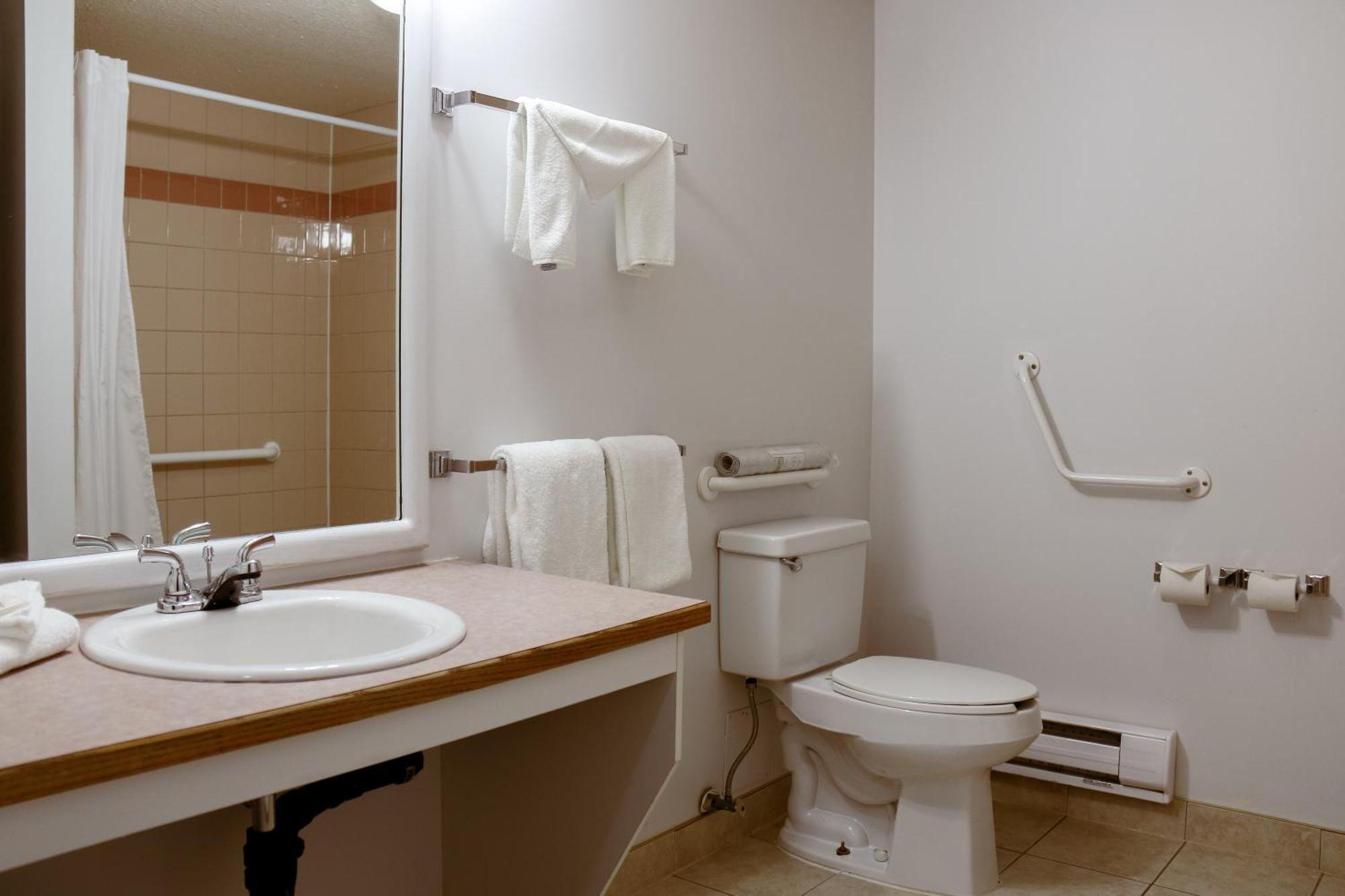 Western Budget Plus Mosaic Suites Penhold Exteriér fotografie