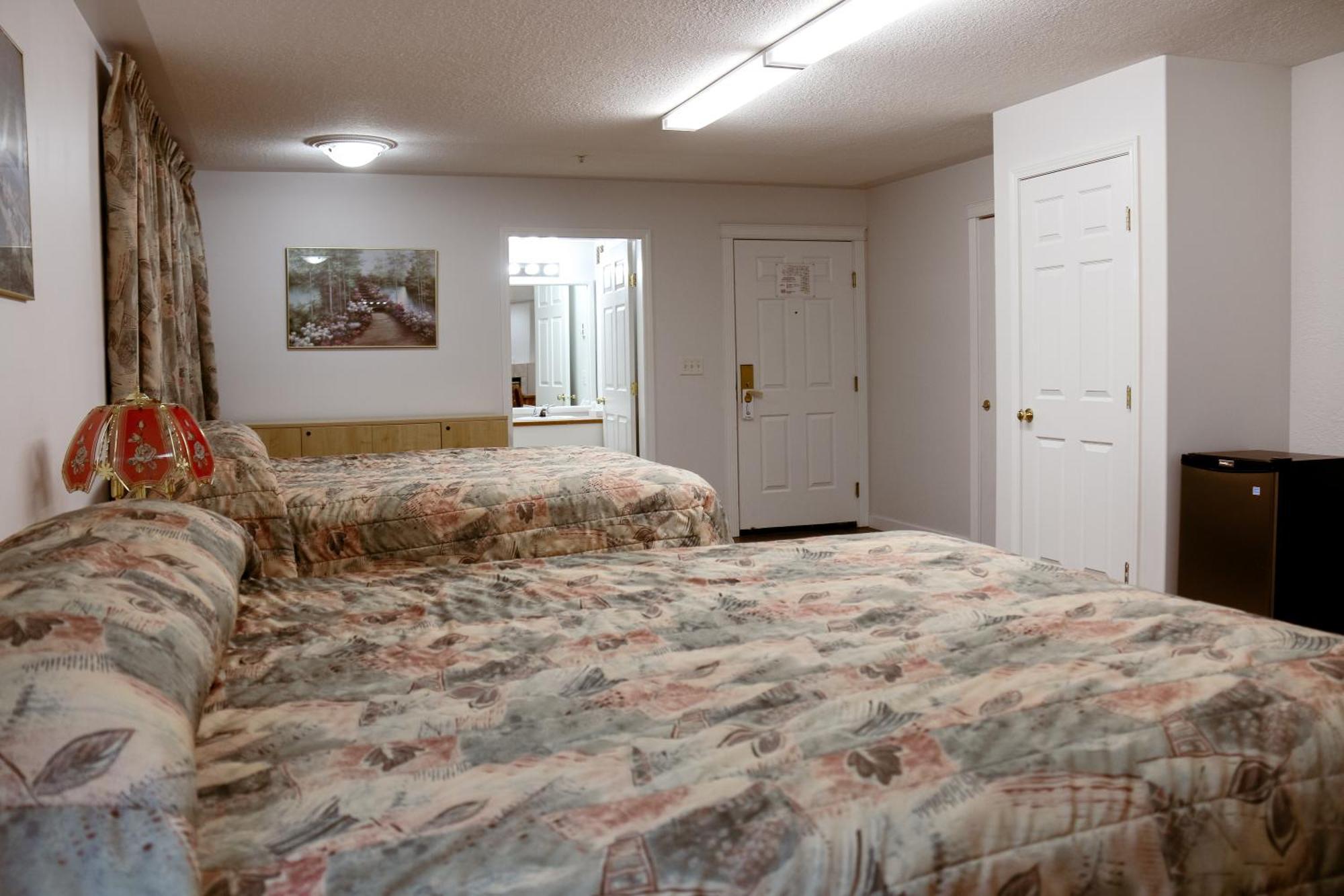 Western Budget Plus Mosaic Suites Penhold Exteriér fotografie
